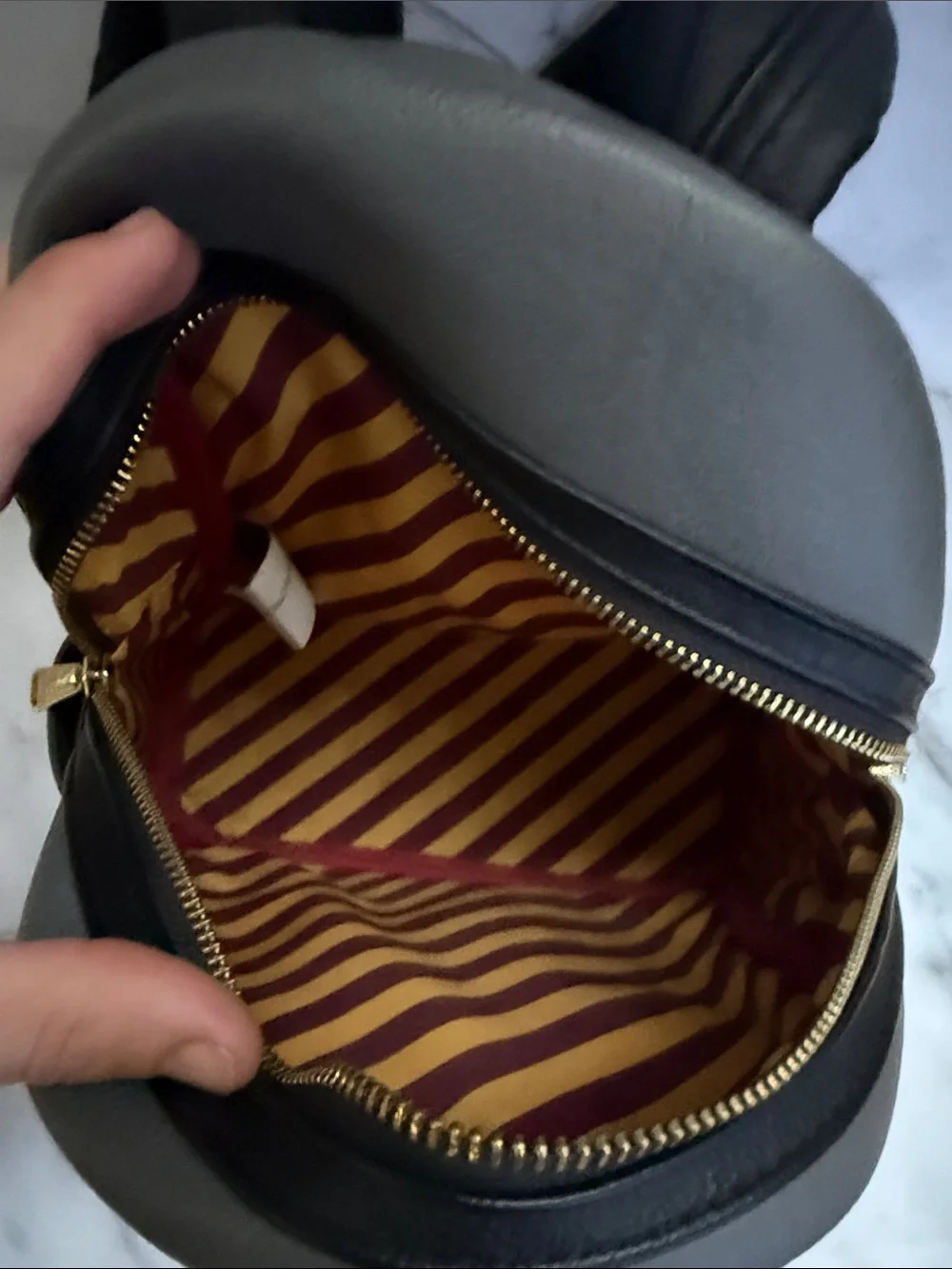 Loungefly Gray Harry Potter Gryffindor Mini Backpack with Red and Gold Accents